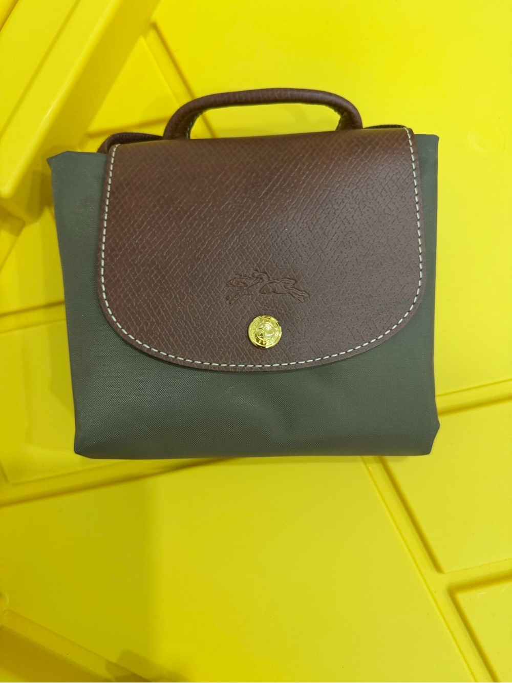 Longchamp Le Pliage Nylon
Canvas Backpack
